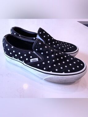 Vans Black and White Slip-On Sneakers